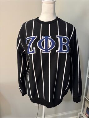Black Crewneck Sweater with White Pinstripes and Blue Lettering